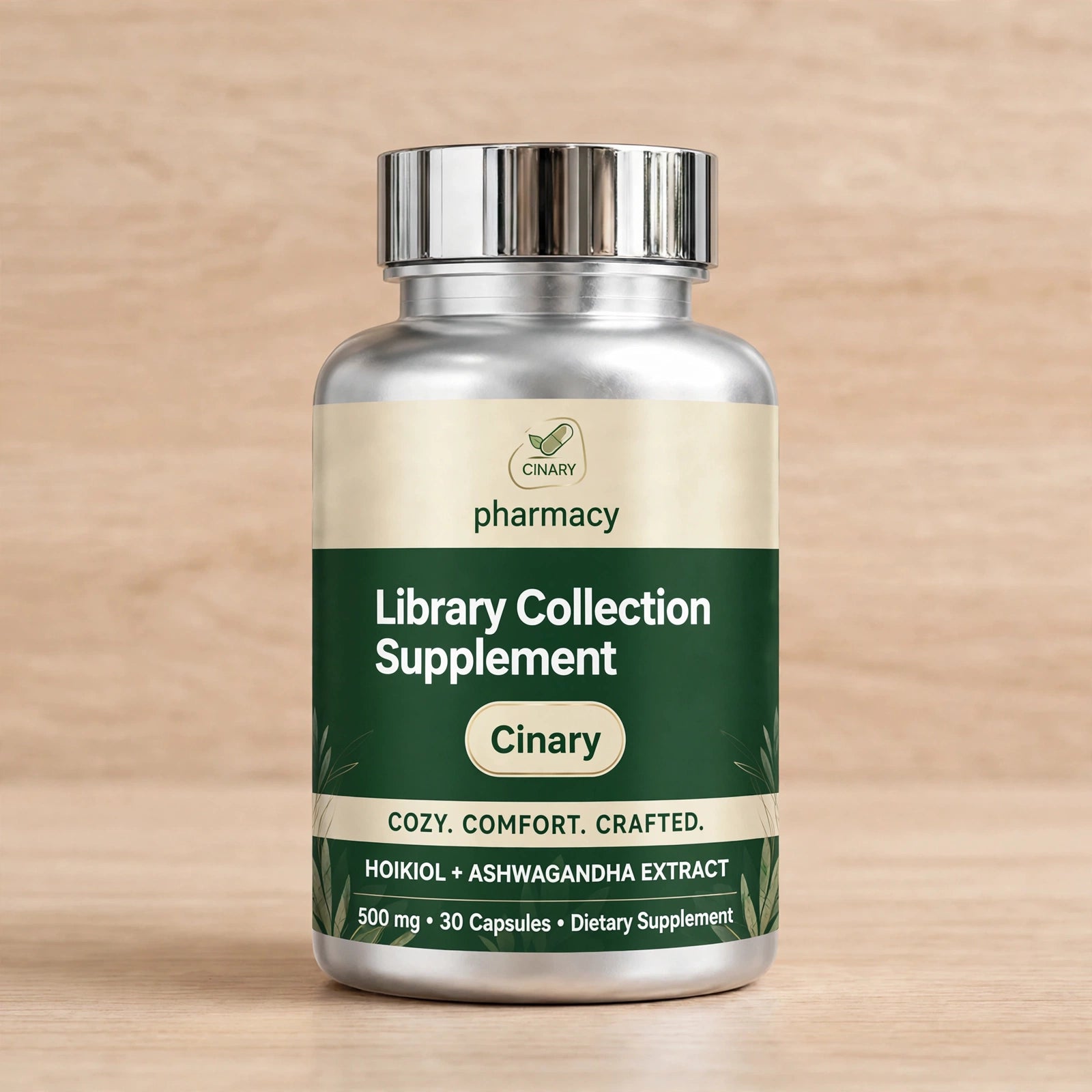 Here's your product packaging closeup — CINARY pharmacy bottle isolated in studio light so the forest green + cream label reads clean: Library Collection Supplement, Cinary pill badge, COZY. COMFORT. CRAFTED., and your 500 mg / 30 capsules lo